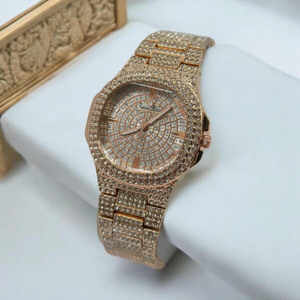 Stylish golden women's watch with square dial and copper chain strap